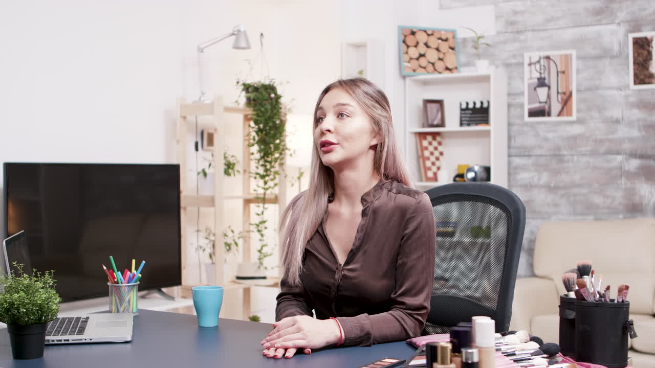 Woman sitting at desk in a workspace