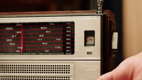vintage radio with hand turning knob