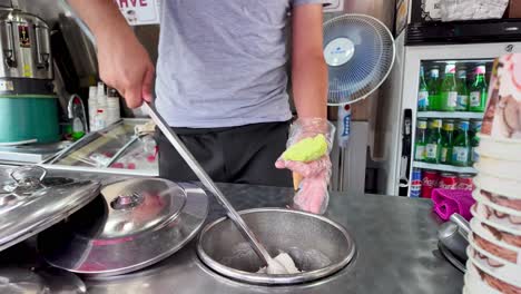 turkish ice cream vendor preparing dondurma