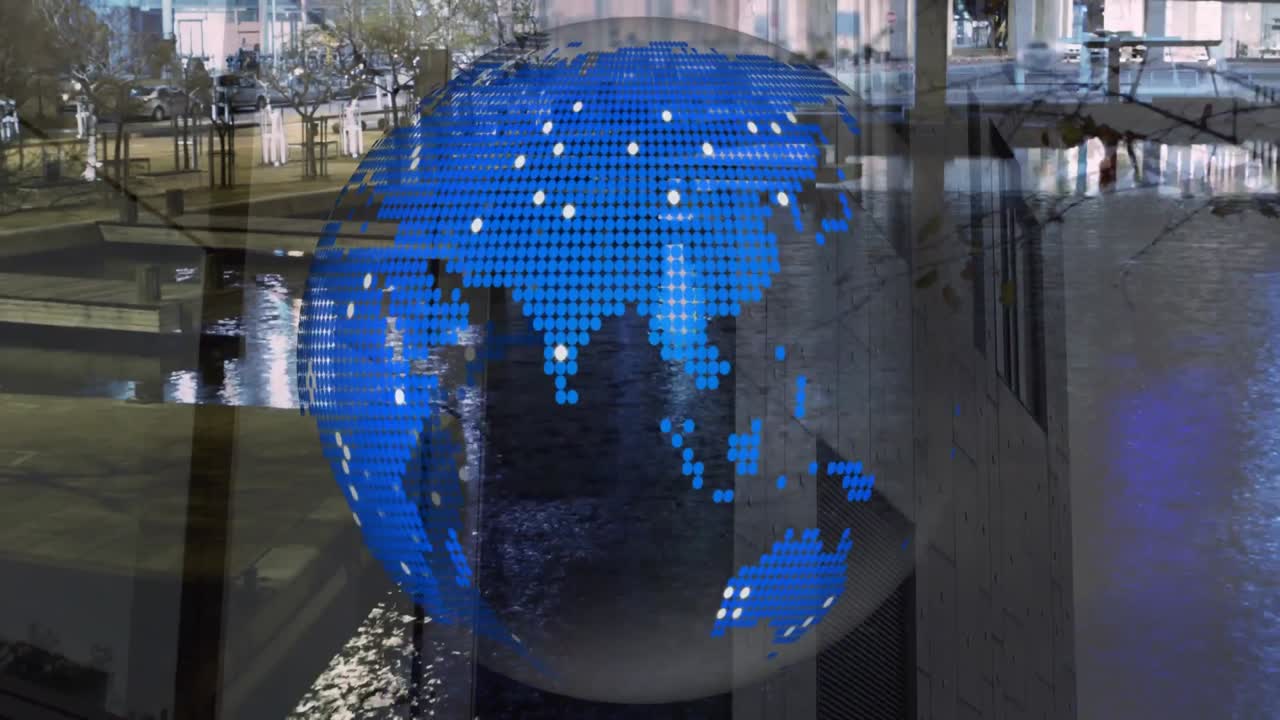 Animation of globe spinning over cityscape