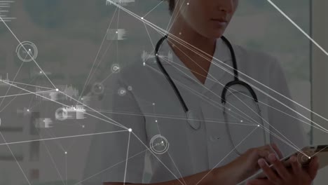 Animation-of-network-of-connections-and-data-processing-over-biracial-female-doctor-using-tablet