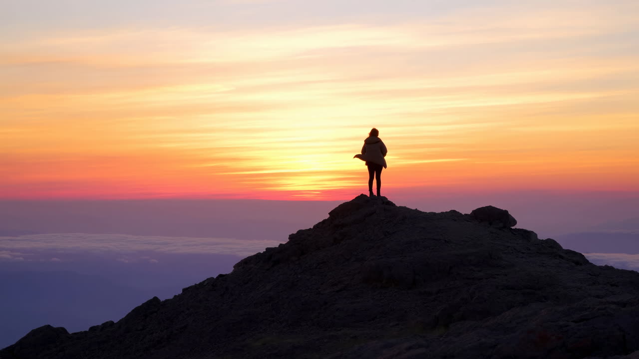Solo Figure On Summit At Sunrise, Backlit Hiker Watching Horizon During Golden Hour, Pastel Sky Blending