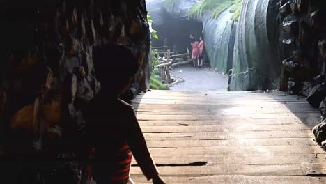 kid walking in slow motion from shadow to light