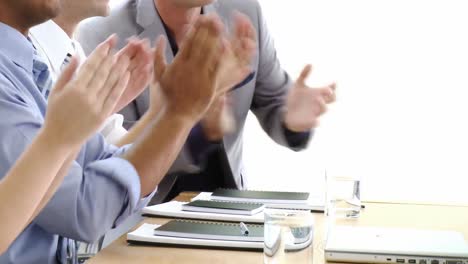 business team applauding after a presentation