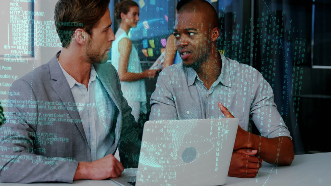 Binary code animation over business people discussing work at laptop