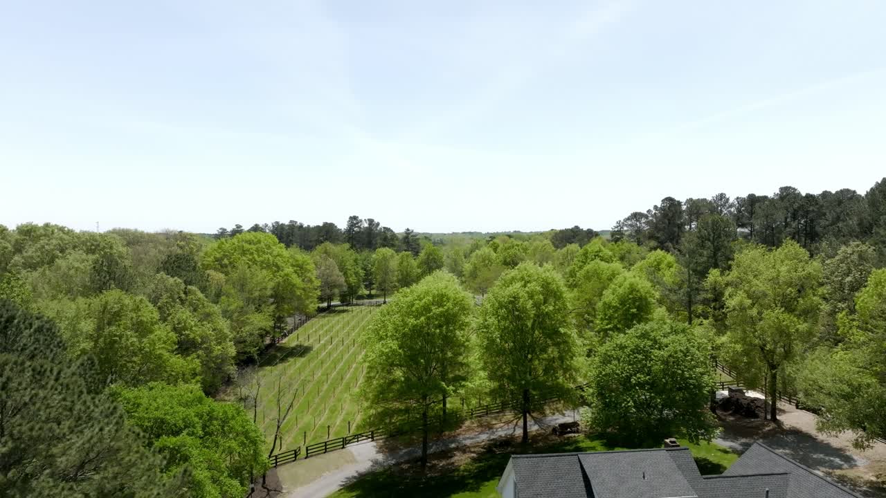 Aerial pullback shot of Stoney J's farm winery reveals Stoney K's courtyard and building, Stoney point road, Cumming, Atlanta, Georgia
