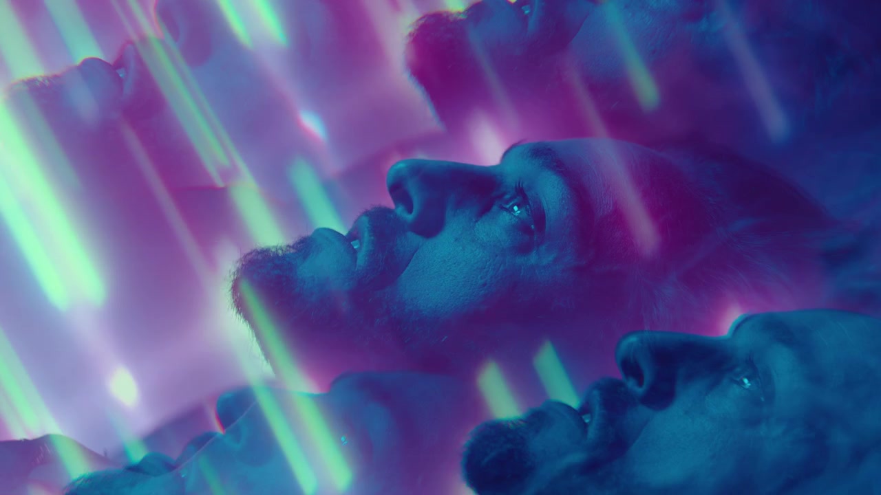 Kaleidoscope Effect of Amazed Man in Neon Light
