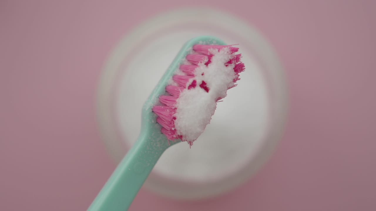 Pink Toothbrush with Baking Soda