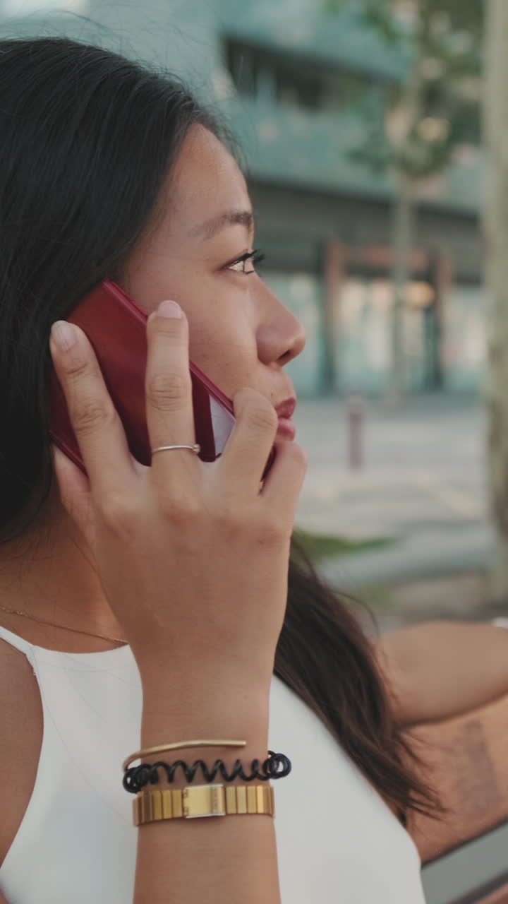 Woman on a phone call in urban environment