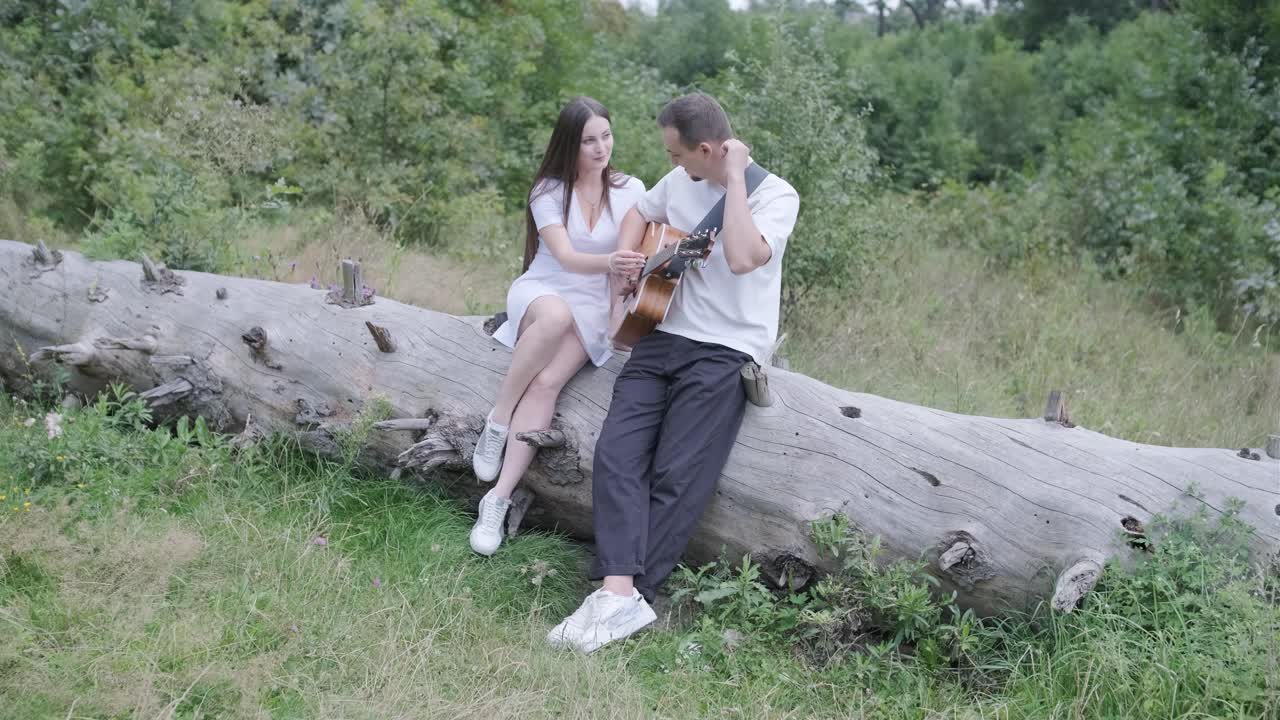Couple enjoying music in nature