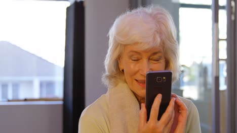 senior woman talking on mobile phone 4k
