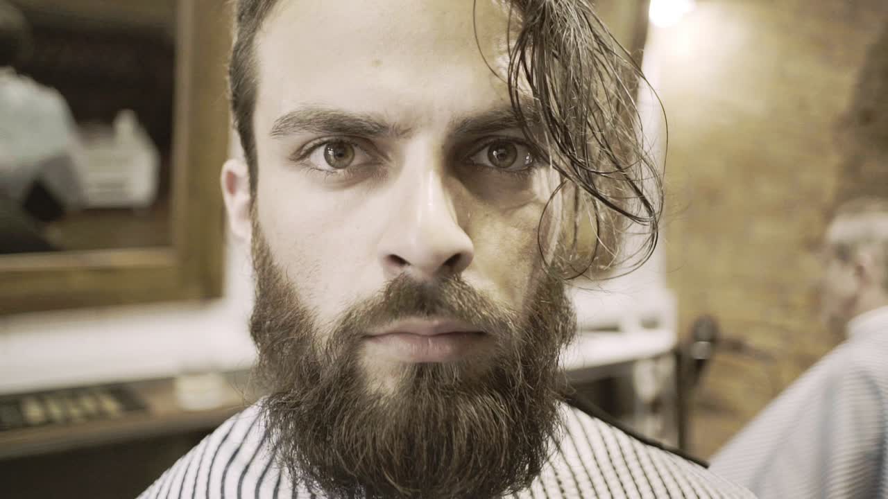 Barber shop hipster. Male face portrait. Male beard face