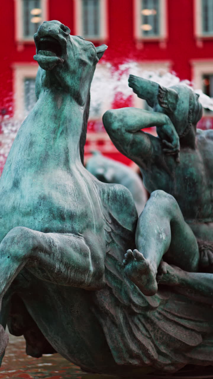Nice, France - December 8, 2024: Close up of the Fontaine du Soleil at Place Massena. Vertical
