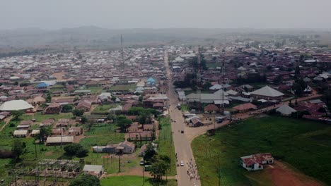 barkin ladi town in nigeria's plateau state - aerial over roads and neighborhoods pullback reveal