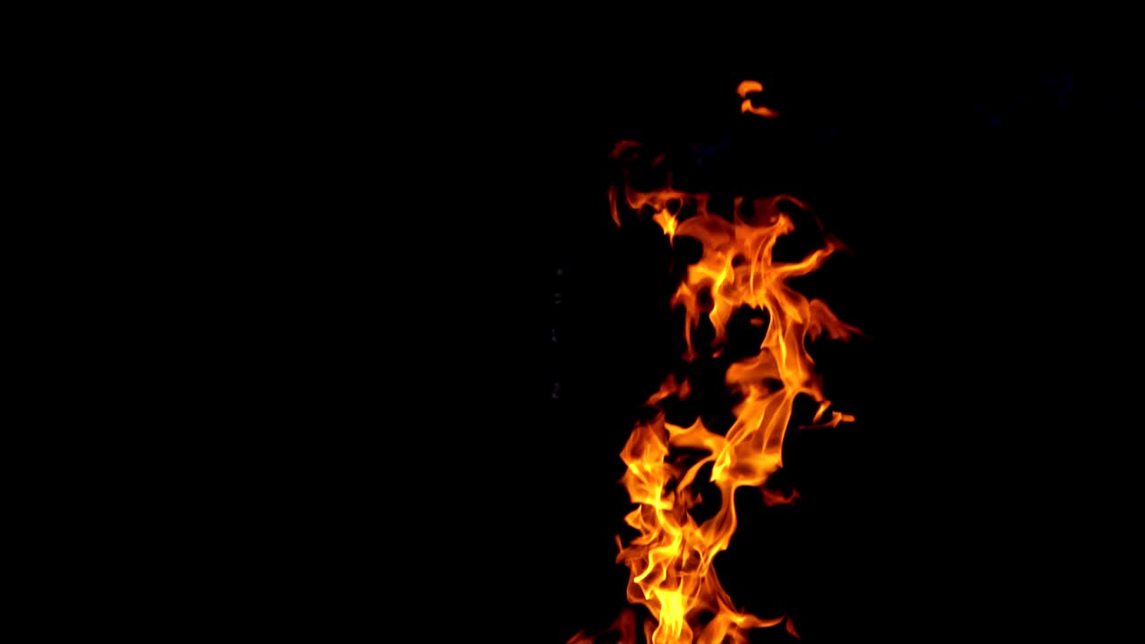 Burning fire. Fire flames on black background. Slow motion
