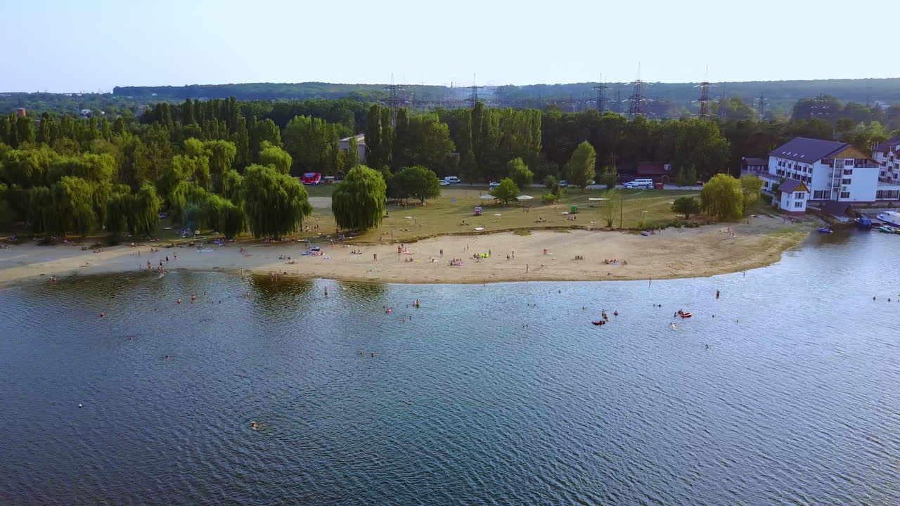 Lake Beach with People Relaxing