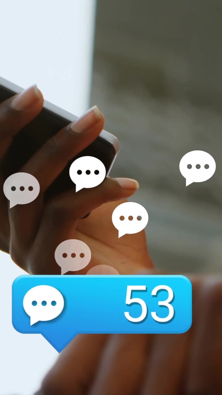 Animation of message icon over mid section of african american woman using smartphone