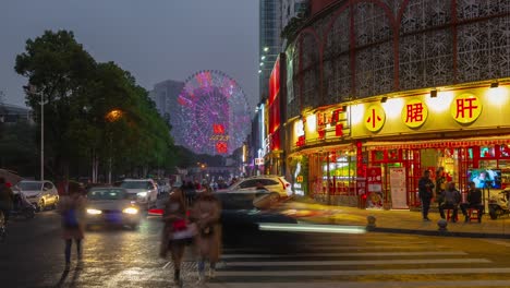 sunset time illumination changsha city famous stadium pedestrian street ferris wheel panorama timelapse 4k china