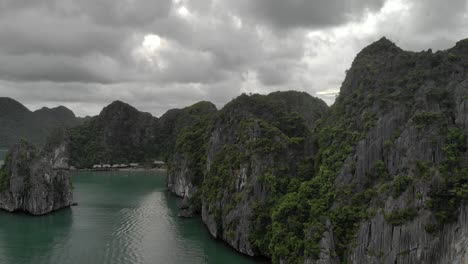 drone panning left to right in ha long bay, vietnam