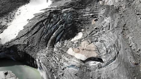 aerial flyover over the crevasses of tiefen glacier in uri, switzerland