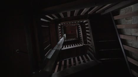 look up of square staircase - slow motion