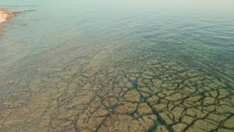 transparent water of a rocky beach in croatia during summer