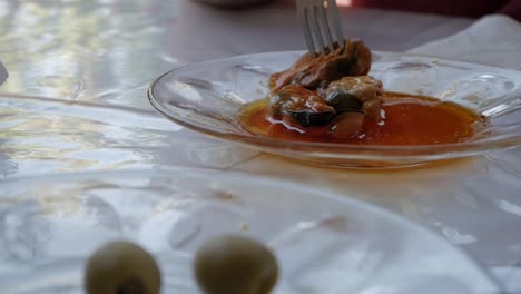 Close-up-of-small-plates-with-appetizer