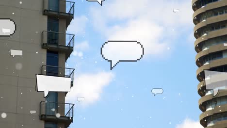 White-particles-and-multiple-blank-speech-bubbles-floating-against-tall-buildings