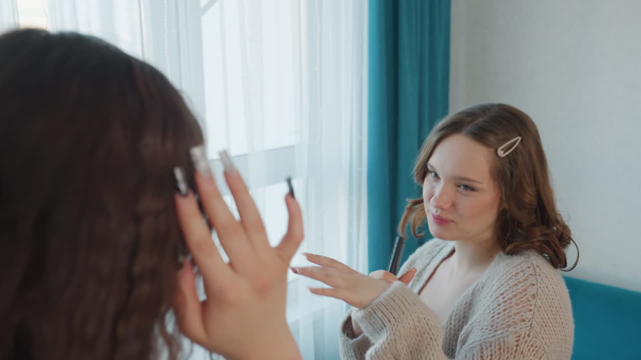 Friend Guides Cosmetics, Woman Discusses Beauty Routines Openly, Brightly Lit Room Features Skincare Dialogue Exchange, Woman Seeks Advice From Friend On Makeup Techniques In Welllit Space