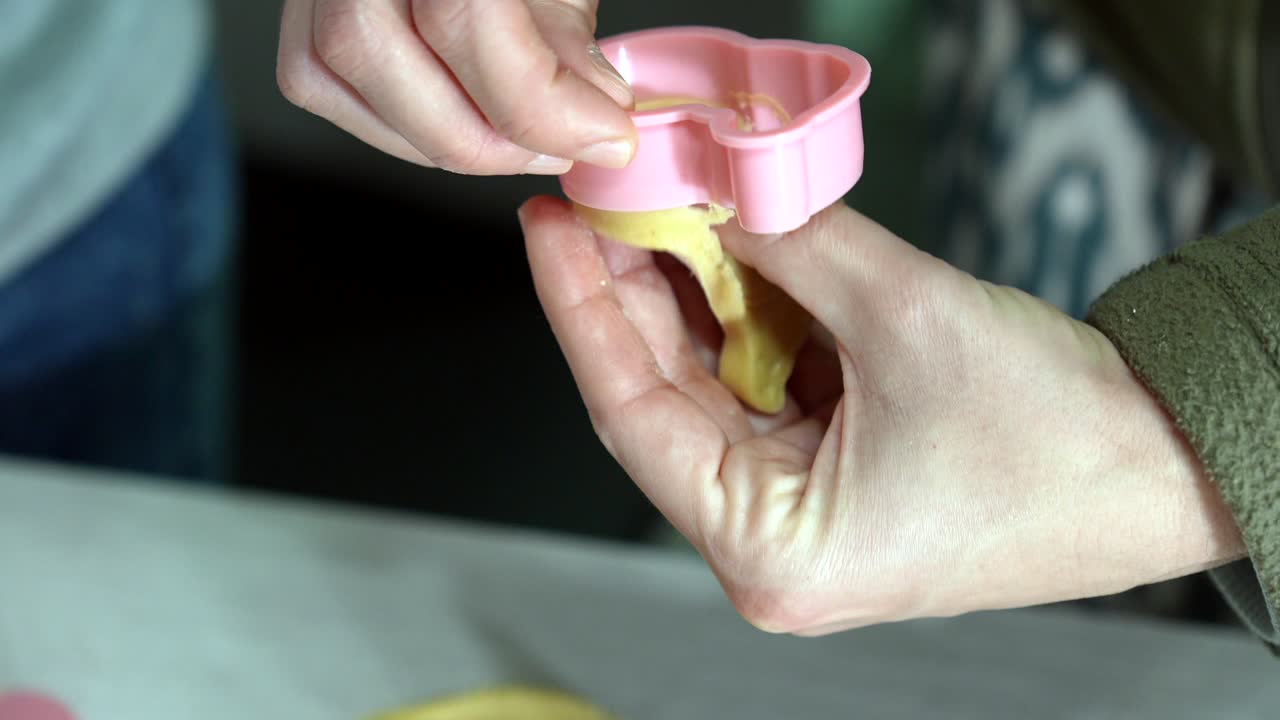 Making cookies with a cookie cutter