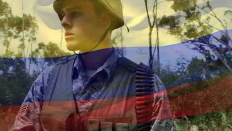 Digital-composition-of-waving-columbia-flag-against-soldier-holding-a-gun-at-training-camp