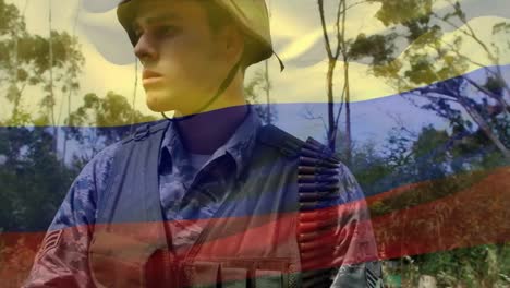 composición digital de agitar la bandera de colombia contra un soldado con un arma en el campamento de entrenamiento