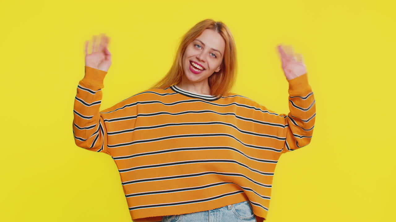 Happy woman smiling friendly waving hands gesturing hello greeting or goodbye meeting invitation