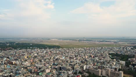 aerial view of dwarka, delhi, with its iconic flyovers and bustling roads at sunrise.