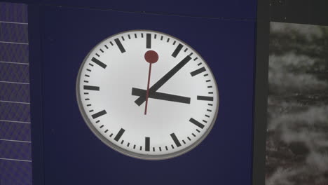 Close-up-of-a-ticking-clock-at-SSB-Bern-Train-Station,-Switzerland