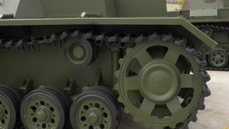 close-up view of a military tank's tracks