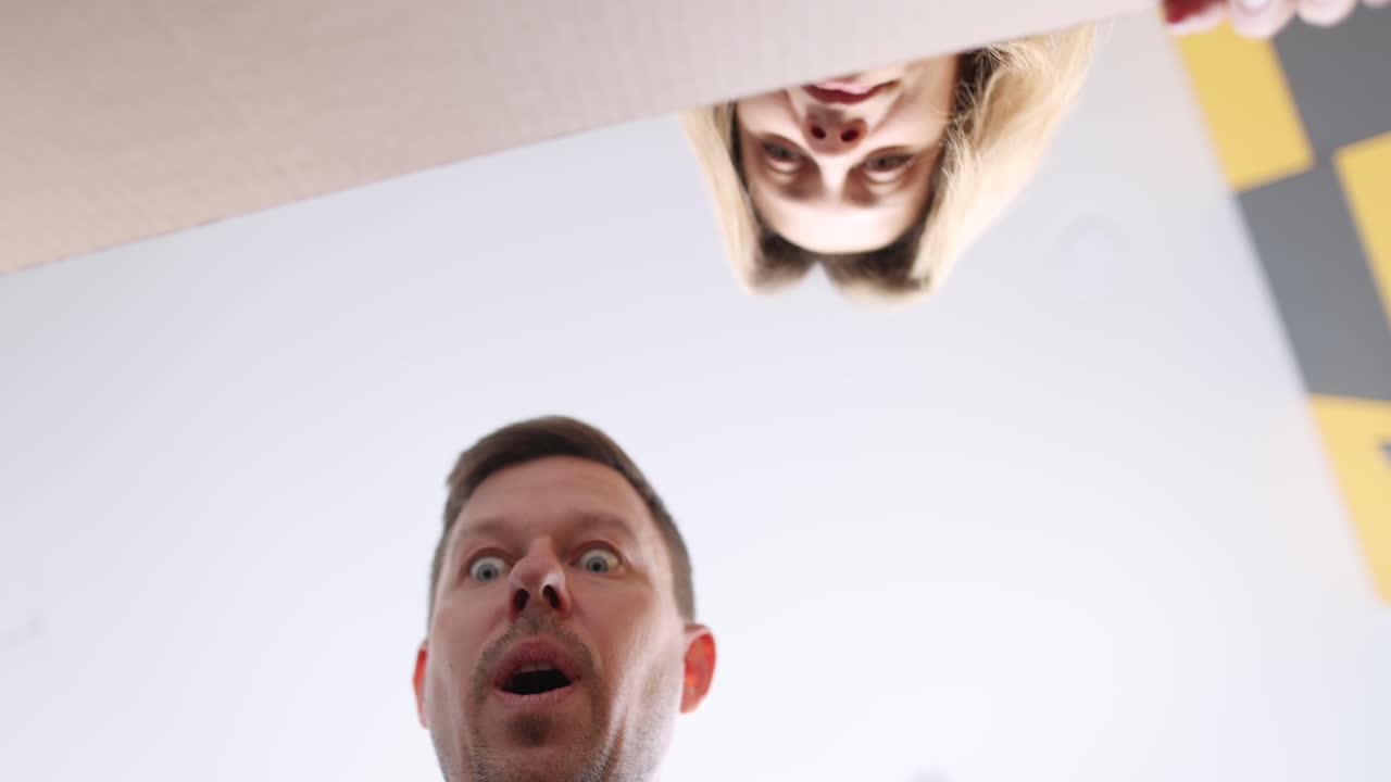 Excited people looking down