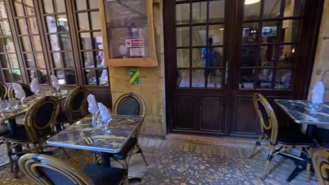 empty tables at a charming french restaurant