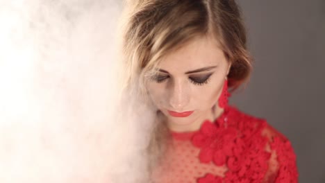 beautiful woman over smoky background