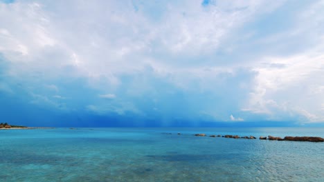 calm caribbean sea before storm with beautiful cloudy sky, curacao beach