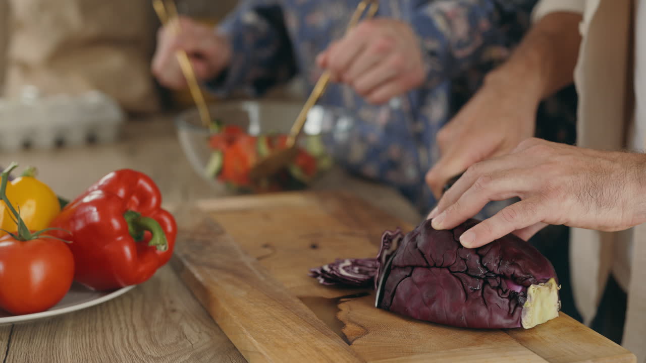 Couple preparing a salad