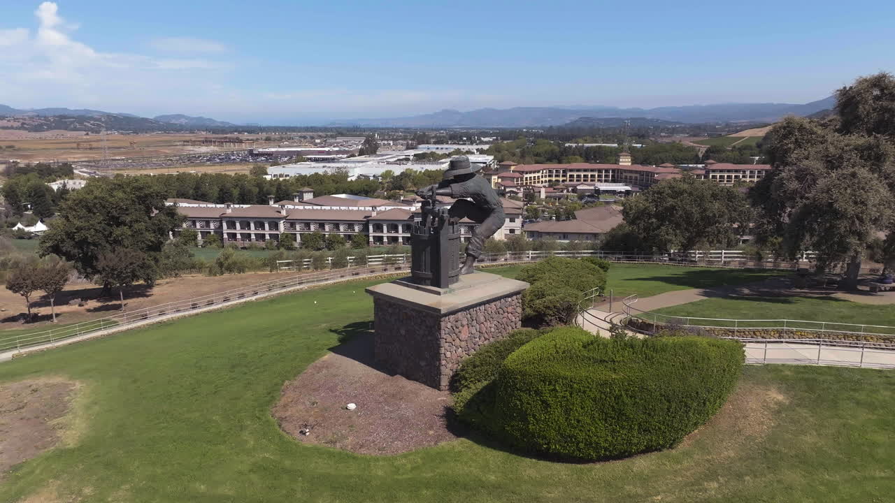 Grape Crusher Statue At The Scenic Overlook In Napa Valley, California, USA. - aerial shot