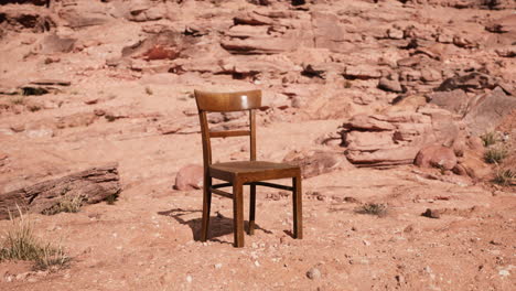 old-wooden-chair-on-rocks-of-Grand-Canyon