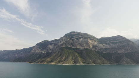 Mountainous Landscape with a Dam and Lake