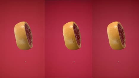 rebanadas de pomelo frescas lanzadas volando colgando en el aire y cayendo