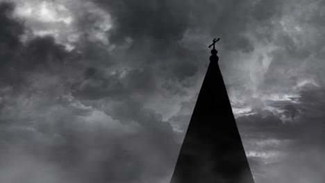 cross pillar at the top of the silhouette building