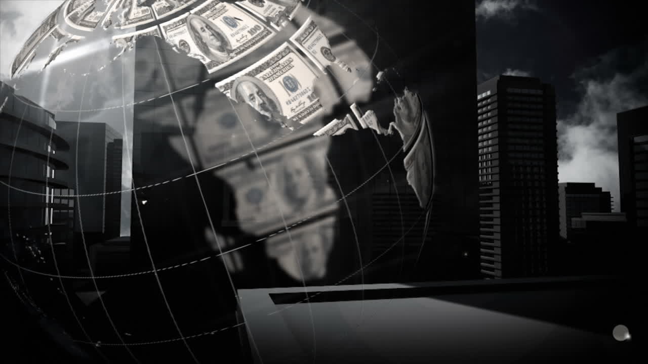 globo giratorio con billetes de dólares