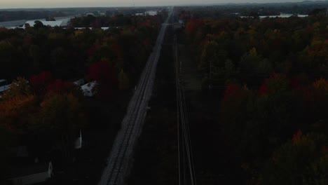 dark morning over a rail road track in michigan