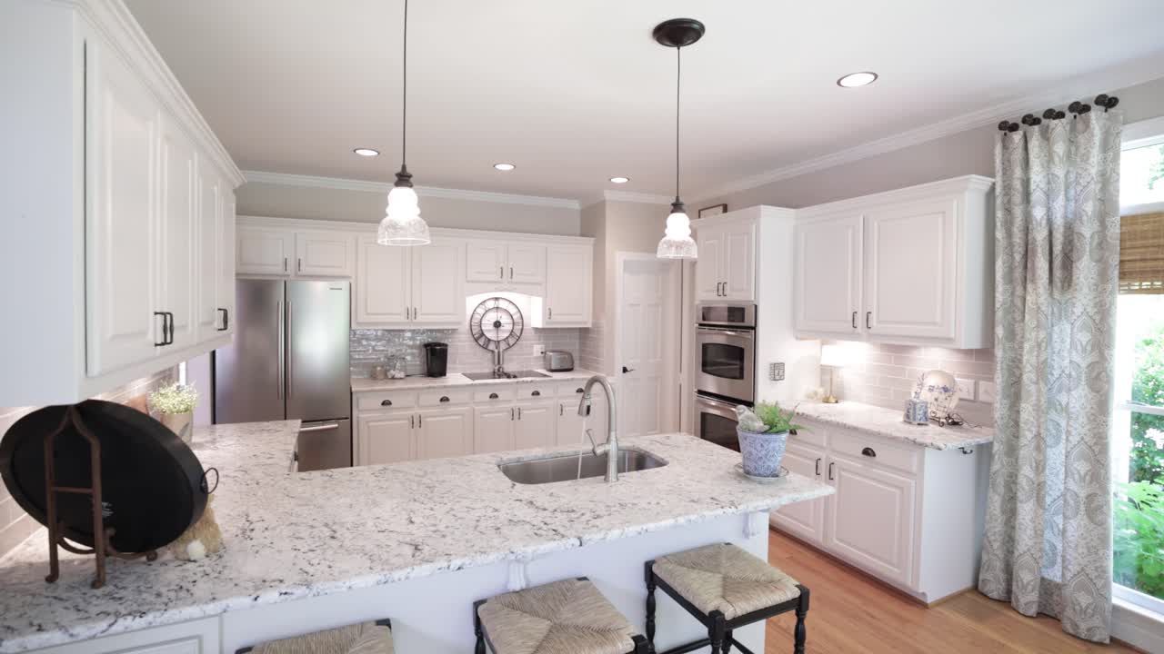 A bright kitchen, fully furnished, evenly and modernly lit