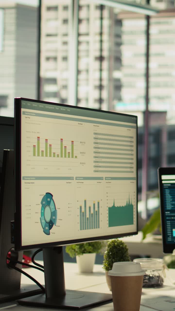 Vertical video Modern workspace with key performance indicators data on display